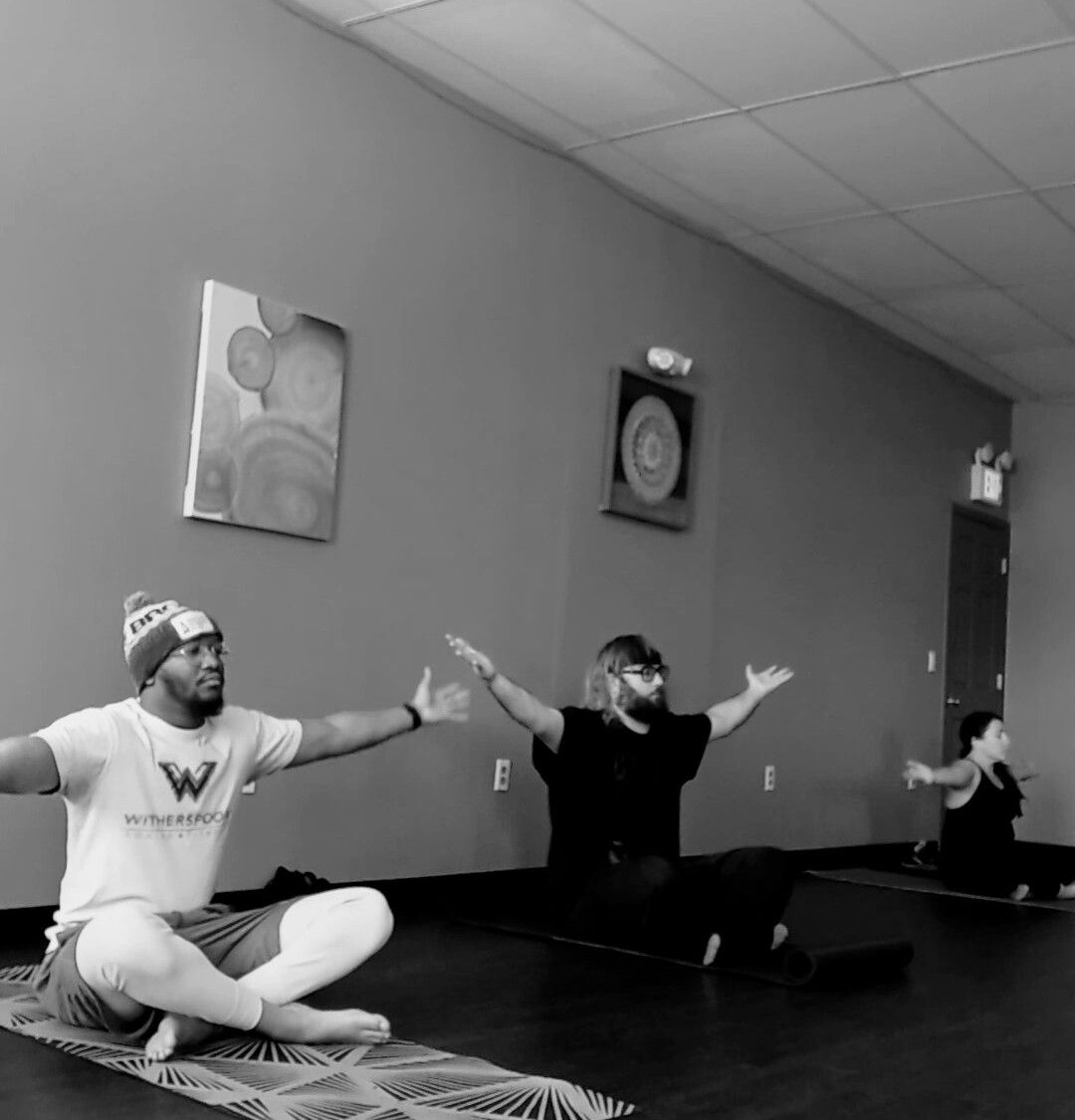 Pad work during boxing classes at Witherspoon